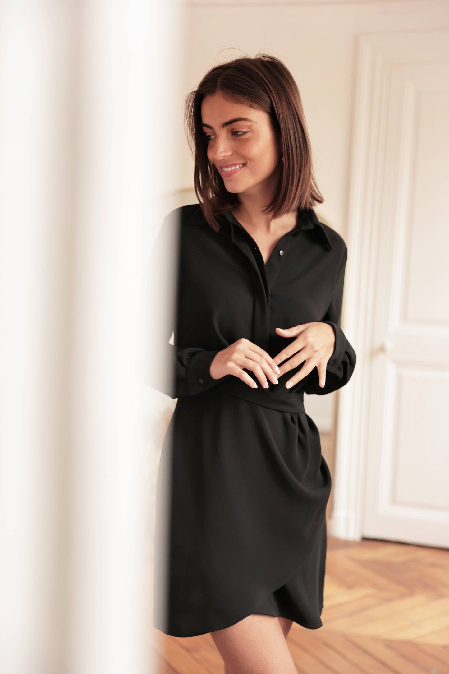 Draped rivoli dress